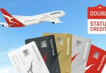 a plane flying over credit cards