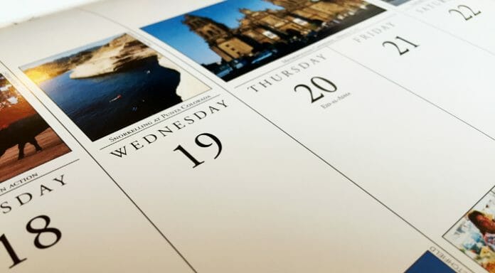 a calendar with a picture of a building and a city
