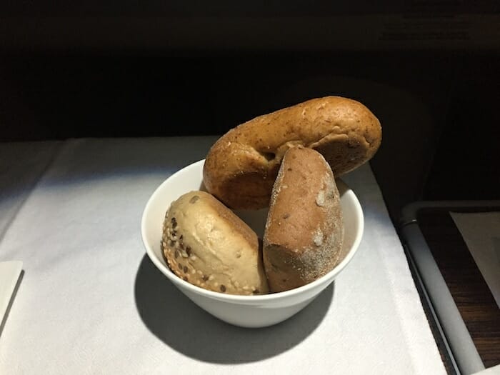 a bowl of bread on a table