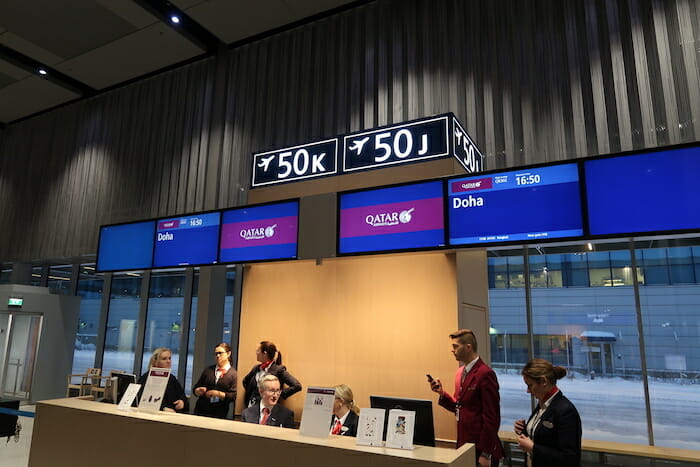 a group of people standing in front of a counter