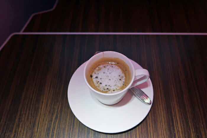 a cup of coffee on a saucer