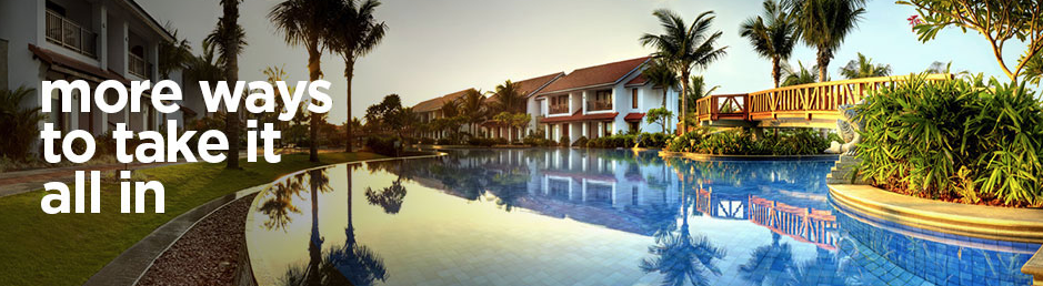 a pool with a building in the background