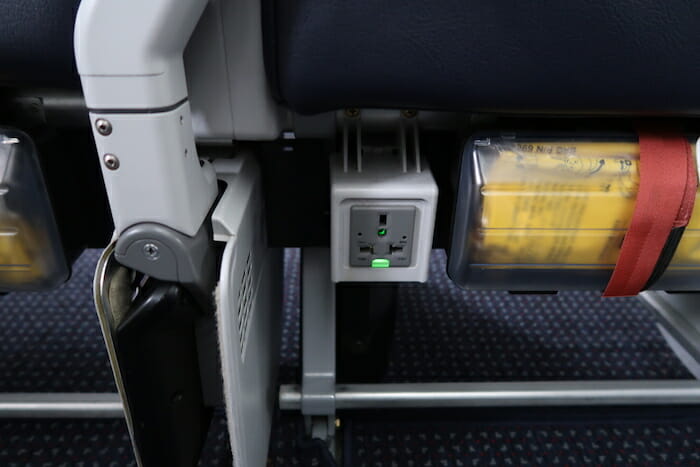 an electrical outlet on a plane