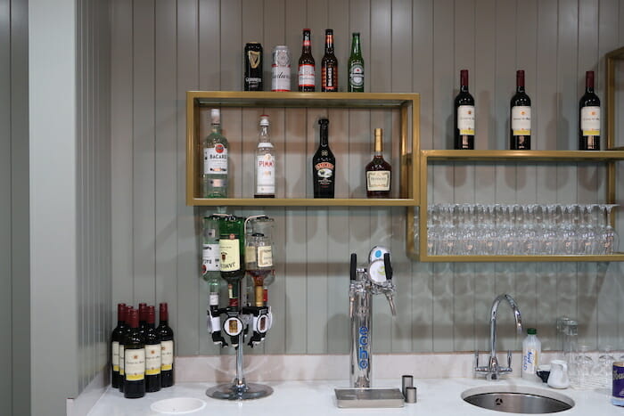 a bar with bottles of alcohol