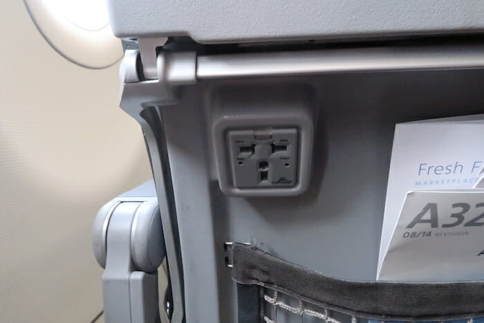 an electrical outlet on a plane