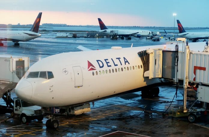 a large white airplane at an airport