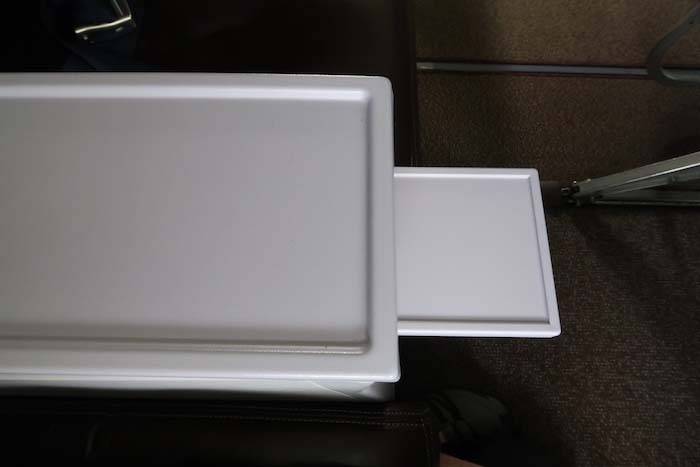 a white box with a drawer