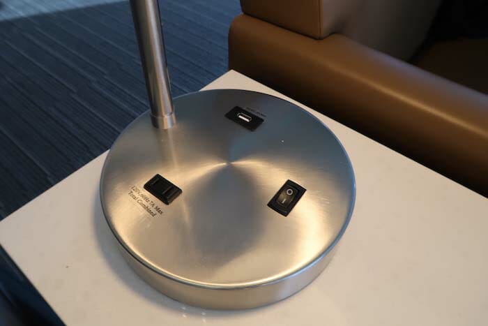 a round metal object with two switches