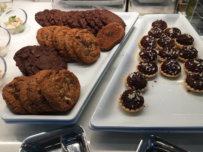 a plate of cookies and pastries