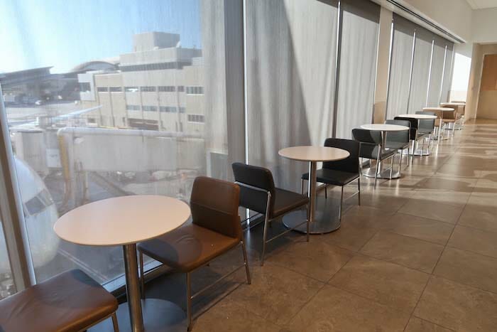 a row of tables and chairs in a room