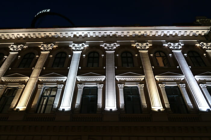 a building with many windows and columns