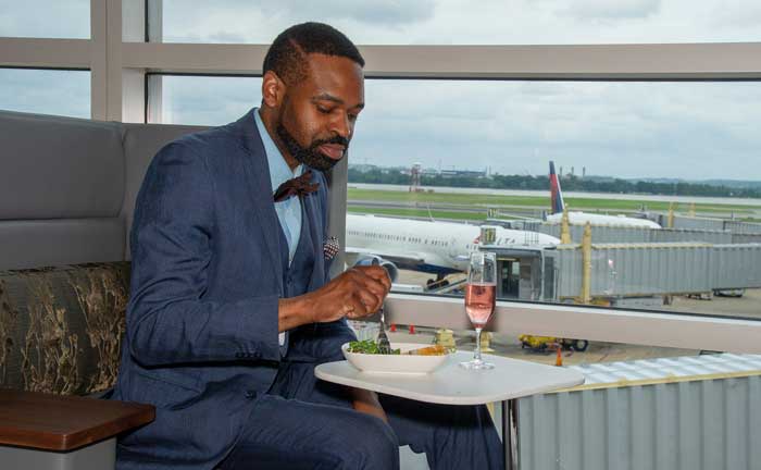 a man eating at a table