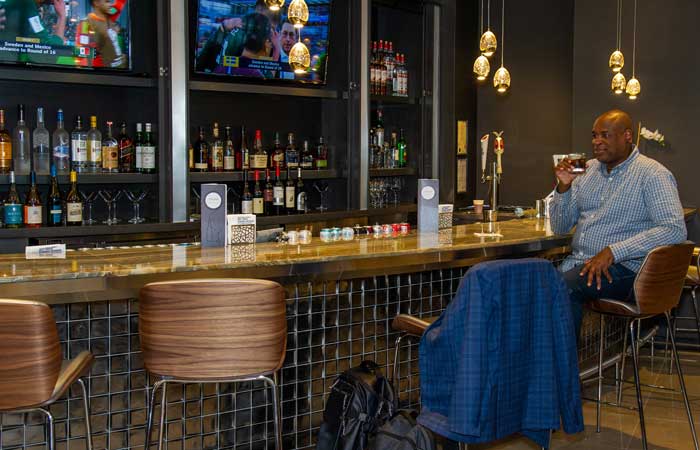 a man sitting at a bar