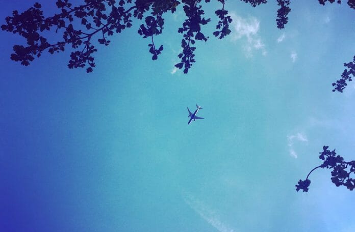 an airplane flying in the sky