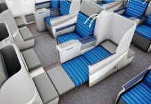 a blue and white seats on an airplane