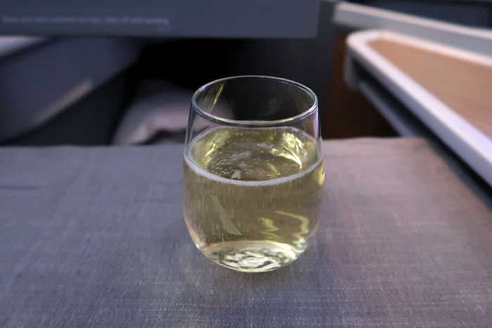 a glass of liquid on a table