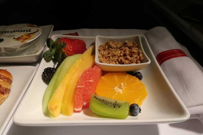 a plate of fruit and cereal