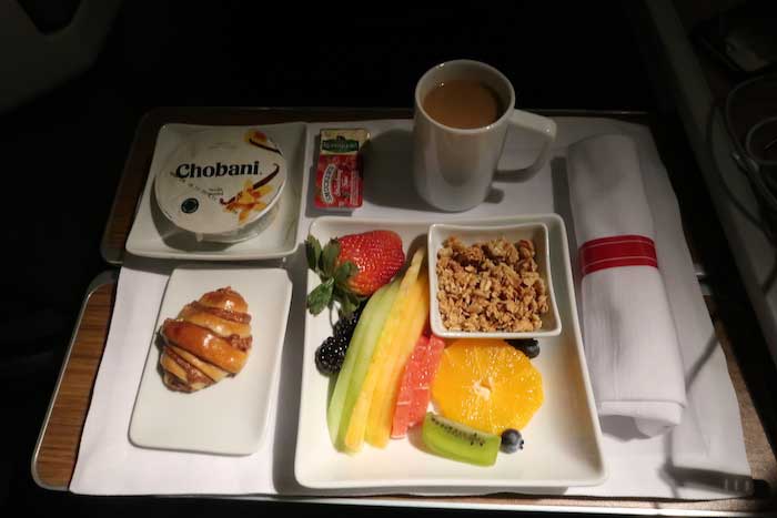 a tray of food and coffee