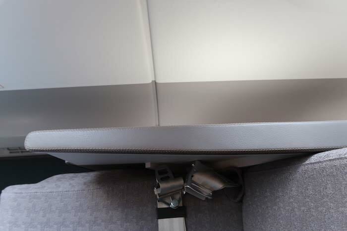 a seat with a seat belt attached to it