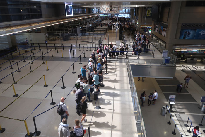 a group of people in a terminal