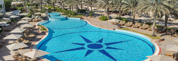 a pool with a sun design on it