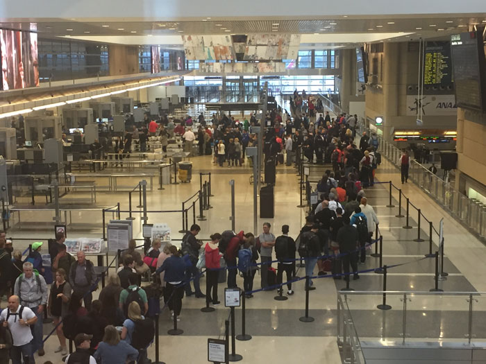 a group of people in a terminal