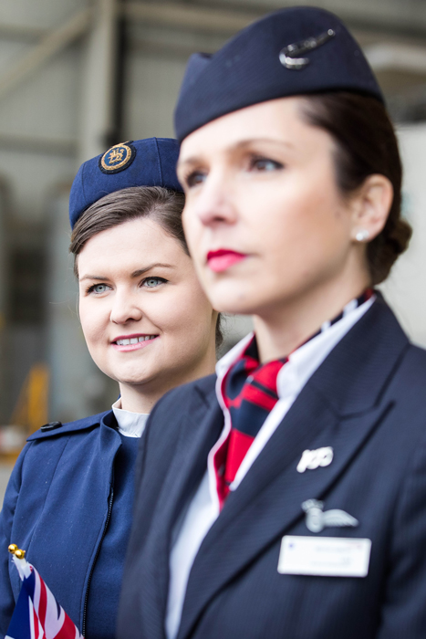 a couple of women wearing uniforms