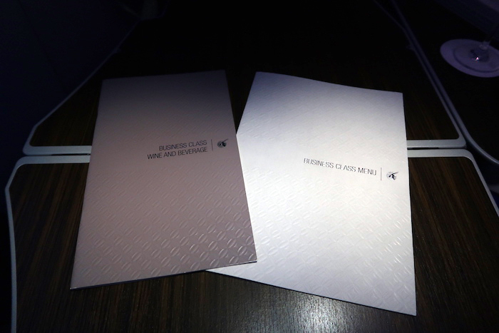 a couple of white and pink menus