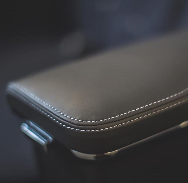a black leather arm rest