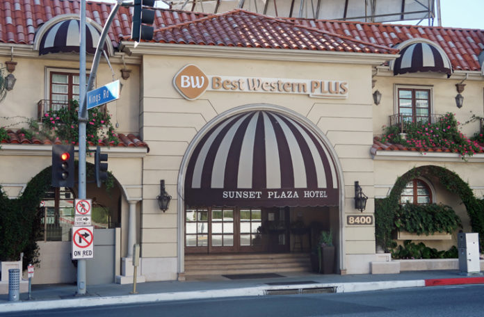 a building with a striped awning