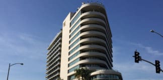 a building with palm trees