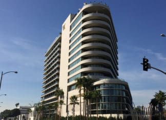 a building with palm trees