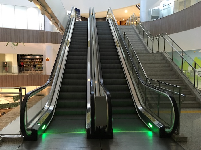 a two escalators in a building