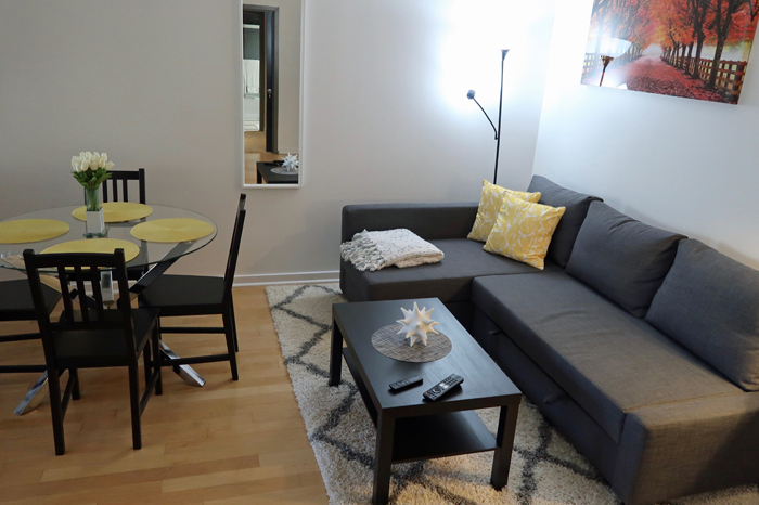 a living room with a couch and a table