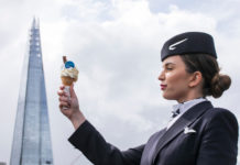 a woman in a suit holding an ice cream cone