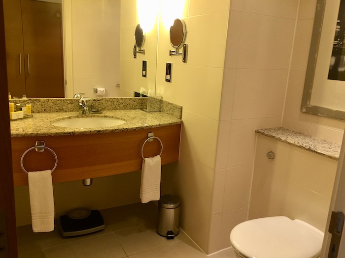 a bathroom with a sink and toilet