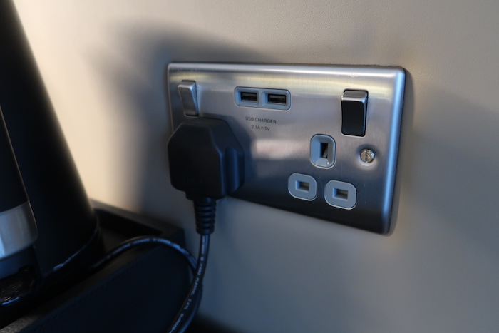 a wall outlet with a plug and usb ports