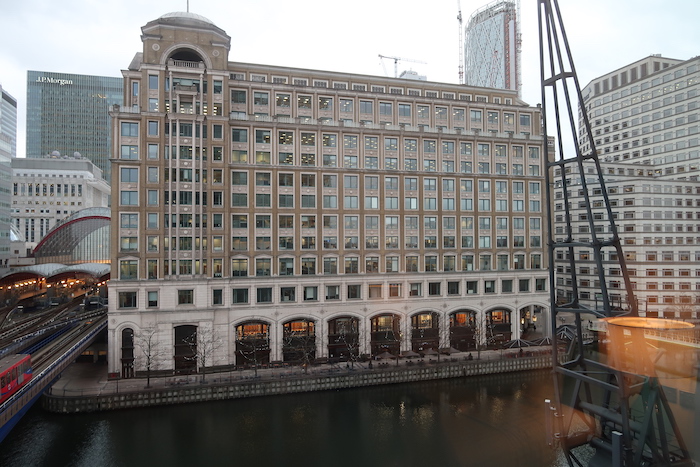 a large building next to a body of water