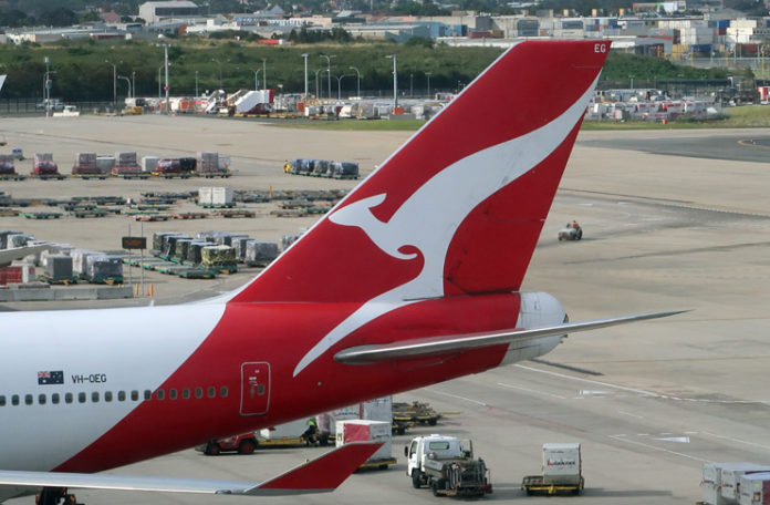 a red and white airplane tail