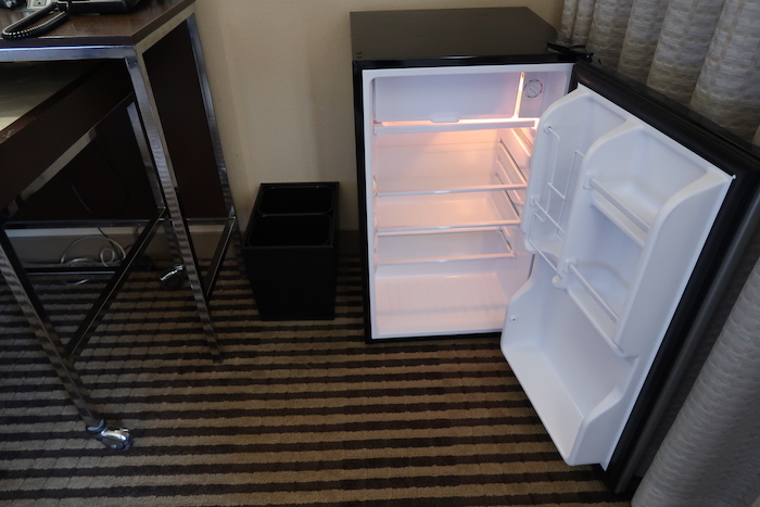 a small refrigerator with a light inside