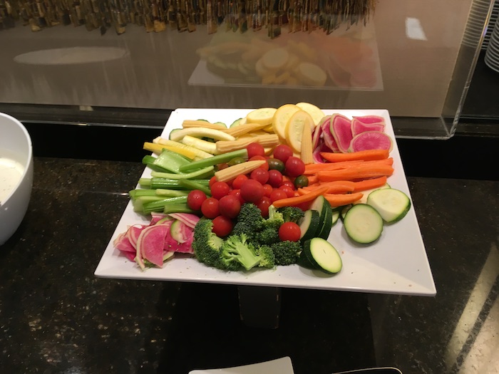 a plate of vegetables on a counter