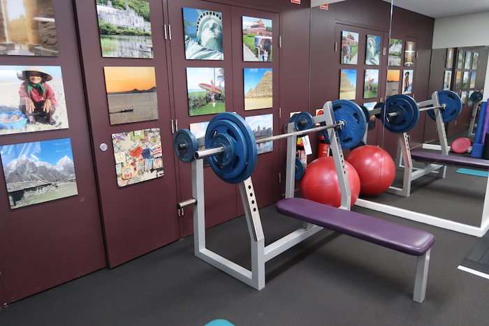 a gym with weights and balls