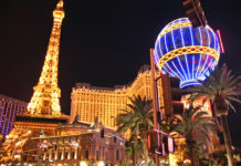 Paris Las Vegas with a tall tower and palm trees