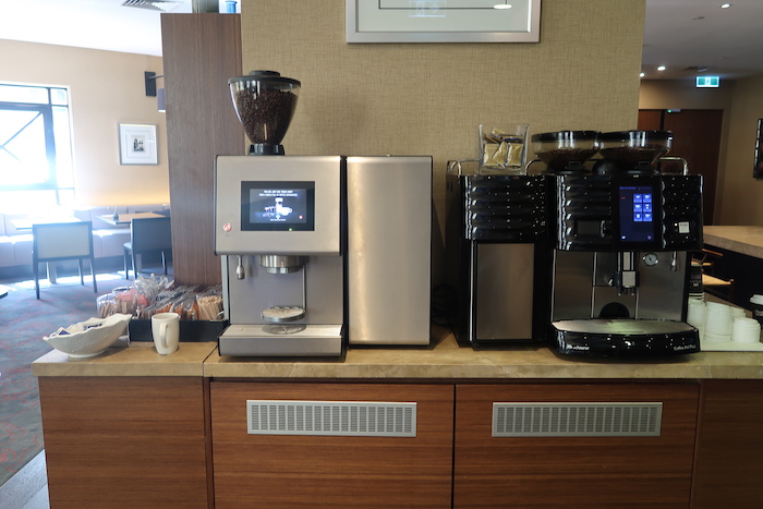 a coffee machine and a machine on a counter