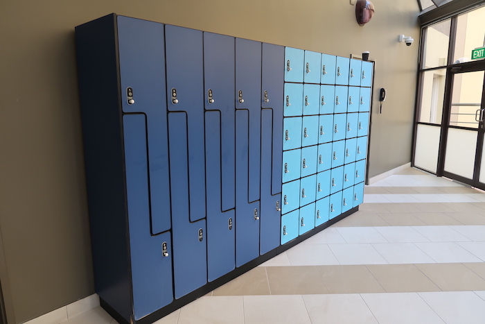 a row of blue lockers
