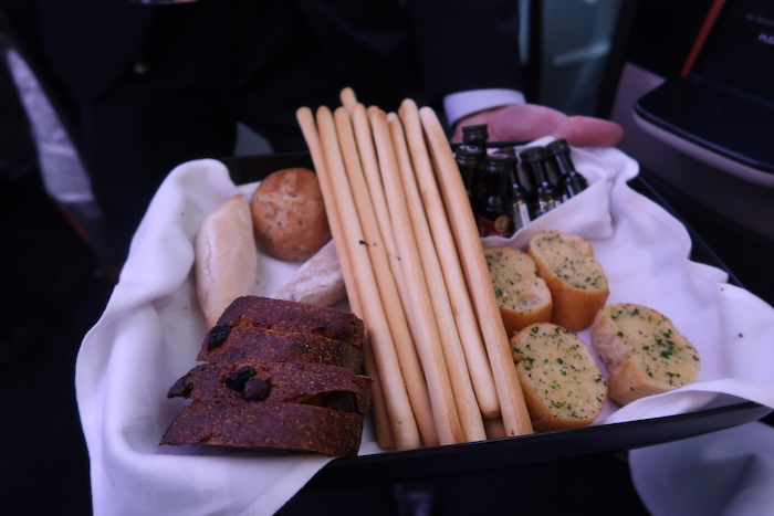 a tray of bread and bread sticks