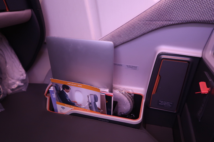 a laptop in a holder in a vehicle