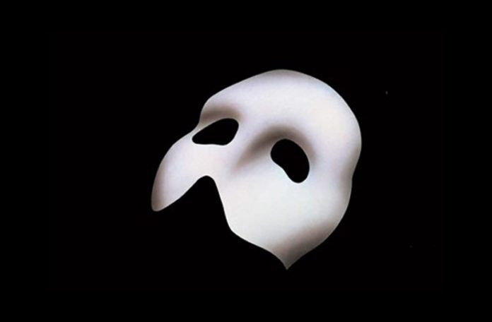 a white mask on a black background