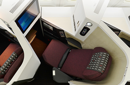 an airplane seat with a computer
