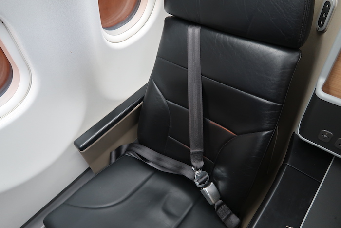 a seat belt on a plane